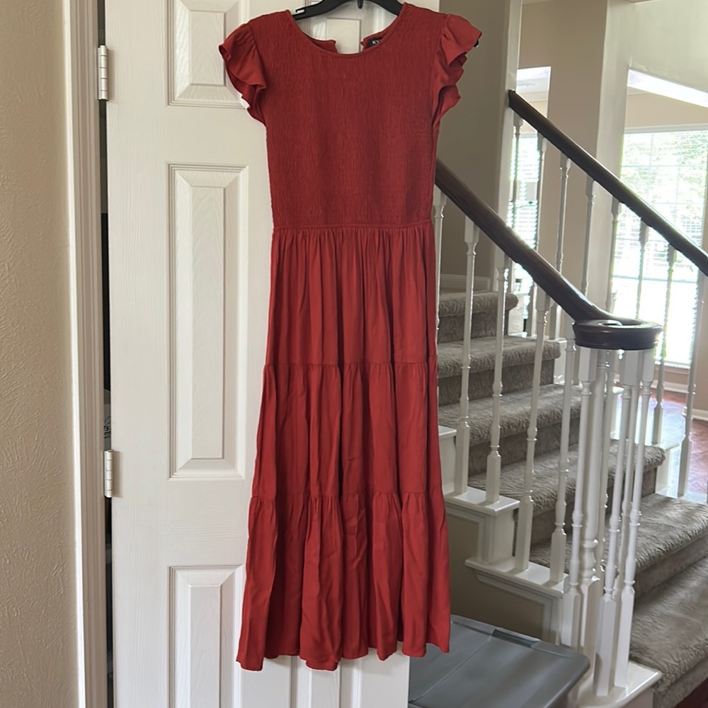 Size small KYL dress. Rust color. Form fitting at the top, tiered maxi dress.